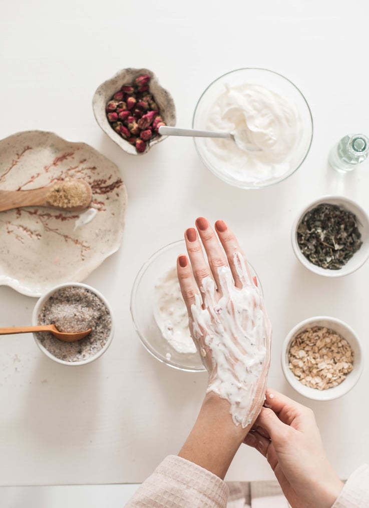 Top View of Woman Applying DIY Mask on Hand